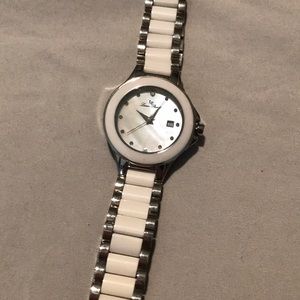 white ceramic watch mother of pearl face
